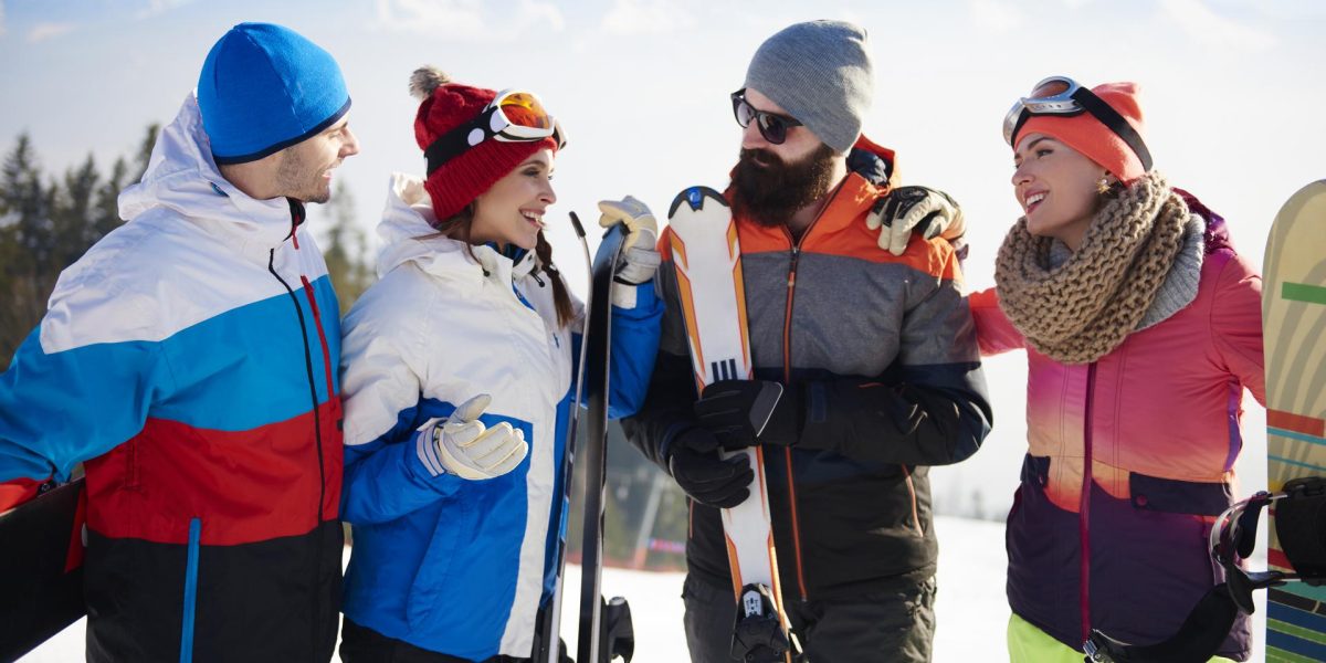 Group of friends having ski weekend